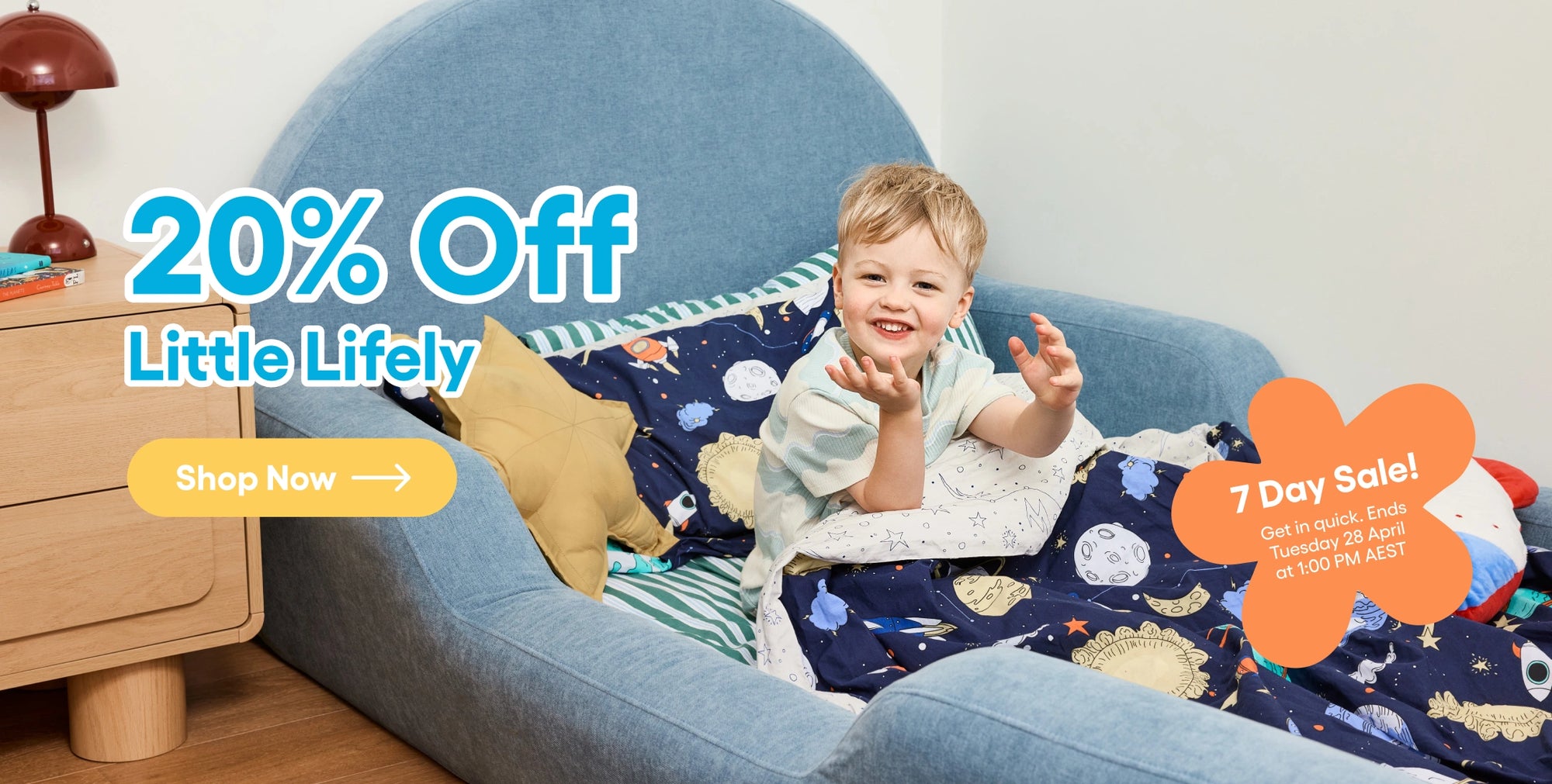 Child sitting on a blue chair with a patterned blanket, promotional text overlay for 'Little Lifely' sale.