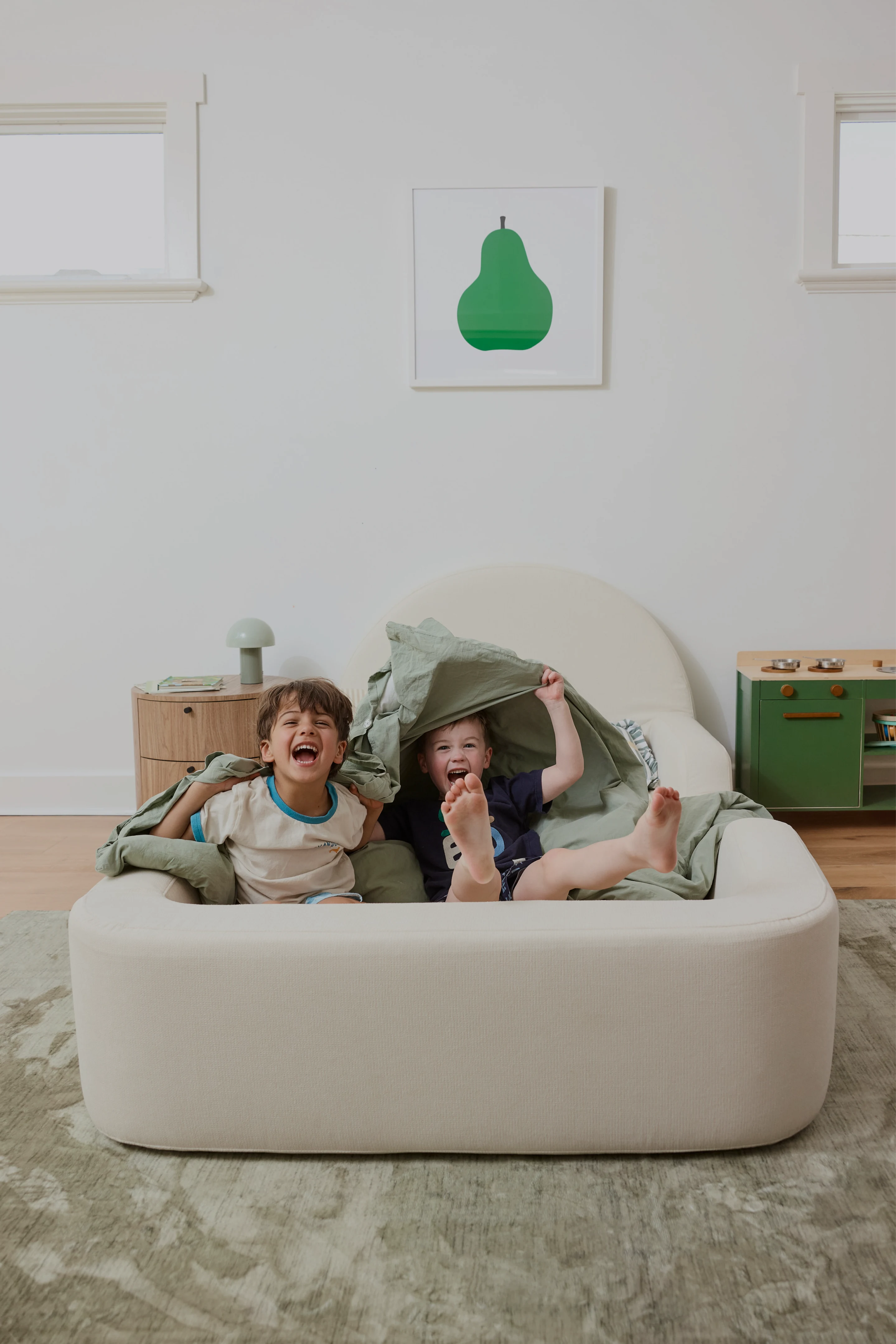 Children on Little Lifely bed